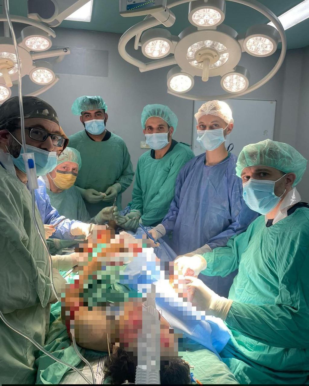 Surgeons operating